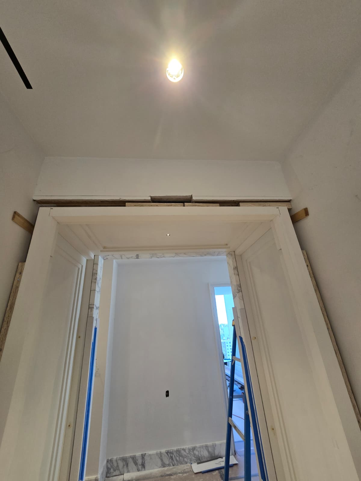 Door frame and trim molding installed during an interior renovation